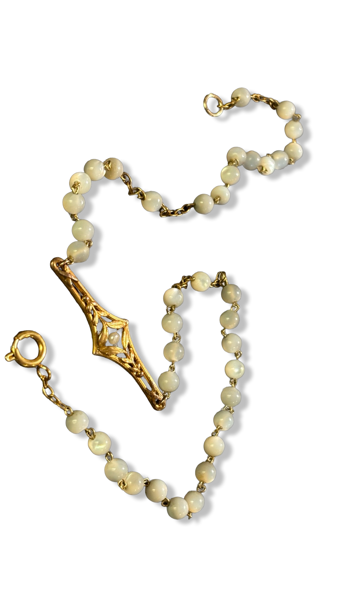 Collier chapelet et motif floral