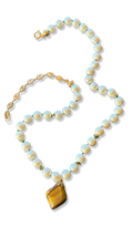 Collier de perles sur fil vert et Oeil de tigre