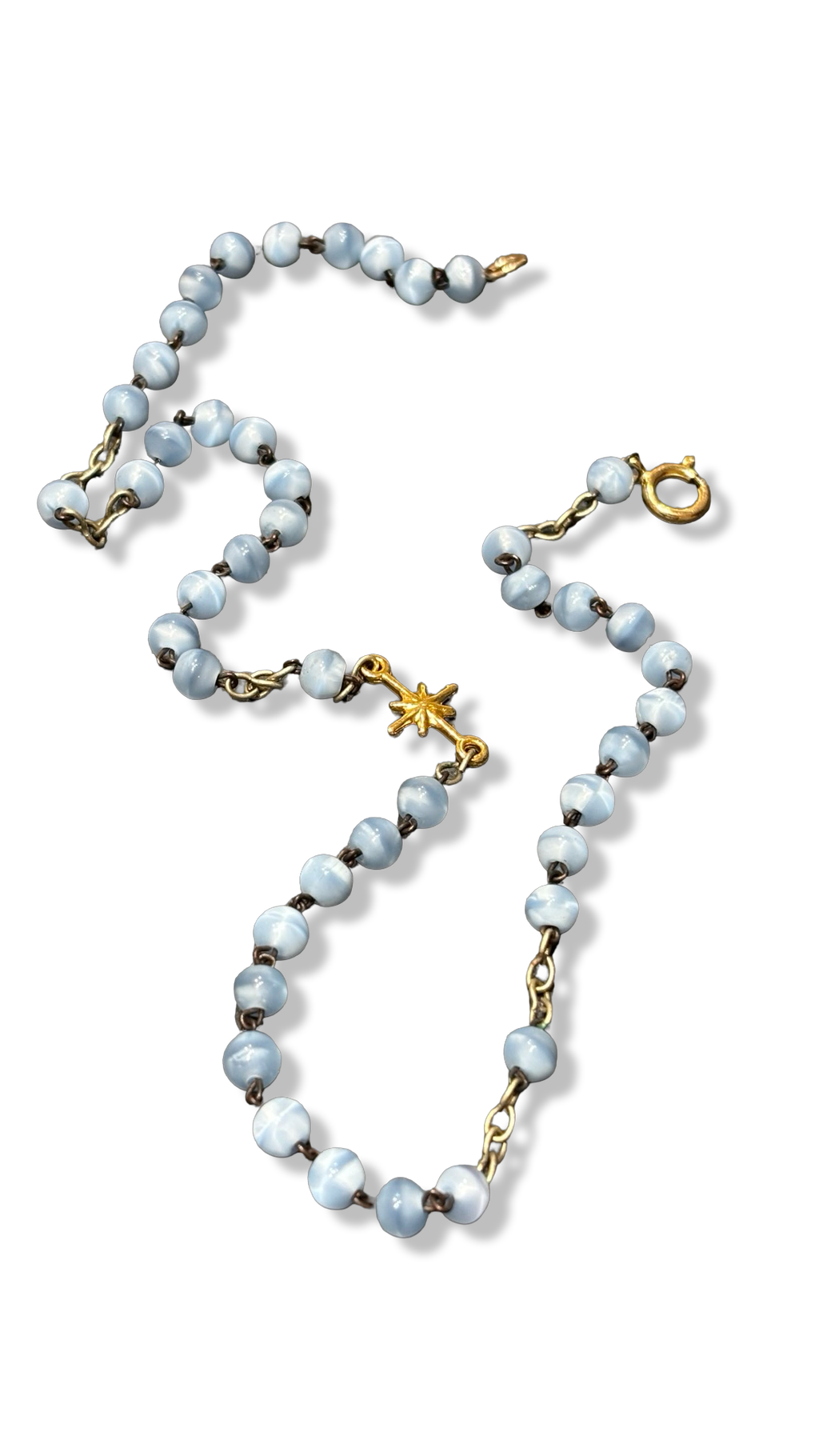 Collier chapelet bleu pale et étoile plaquée or