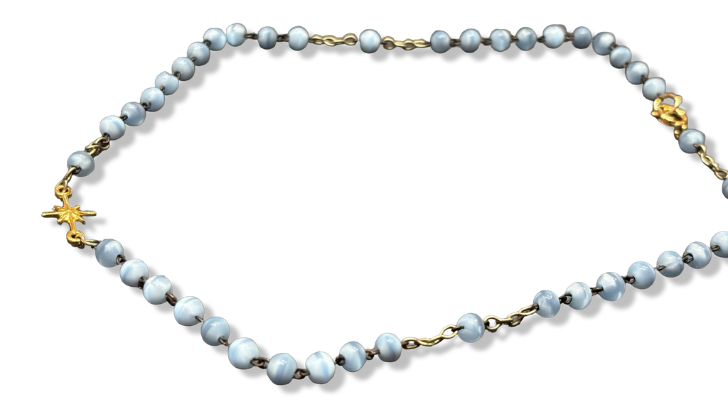 Collier chapelet bleu pale et étoile plaquée or