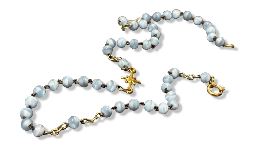 Collier chapelet bleu pale et étoile plaquée or