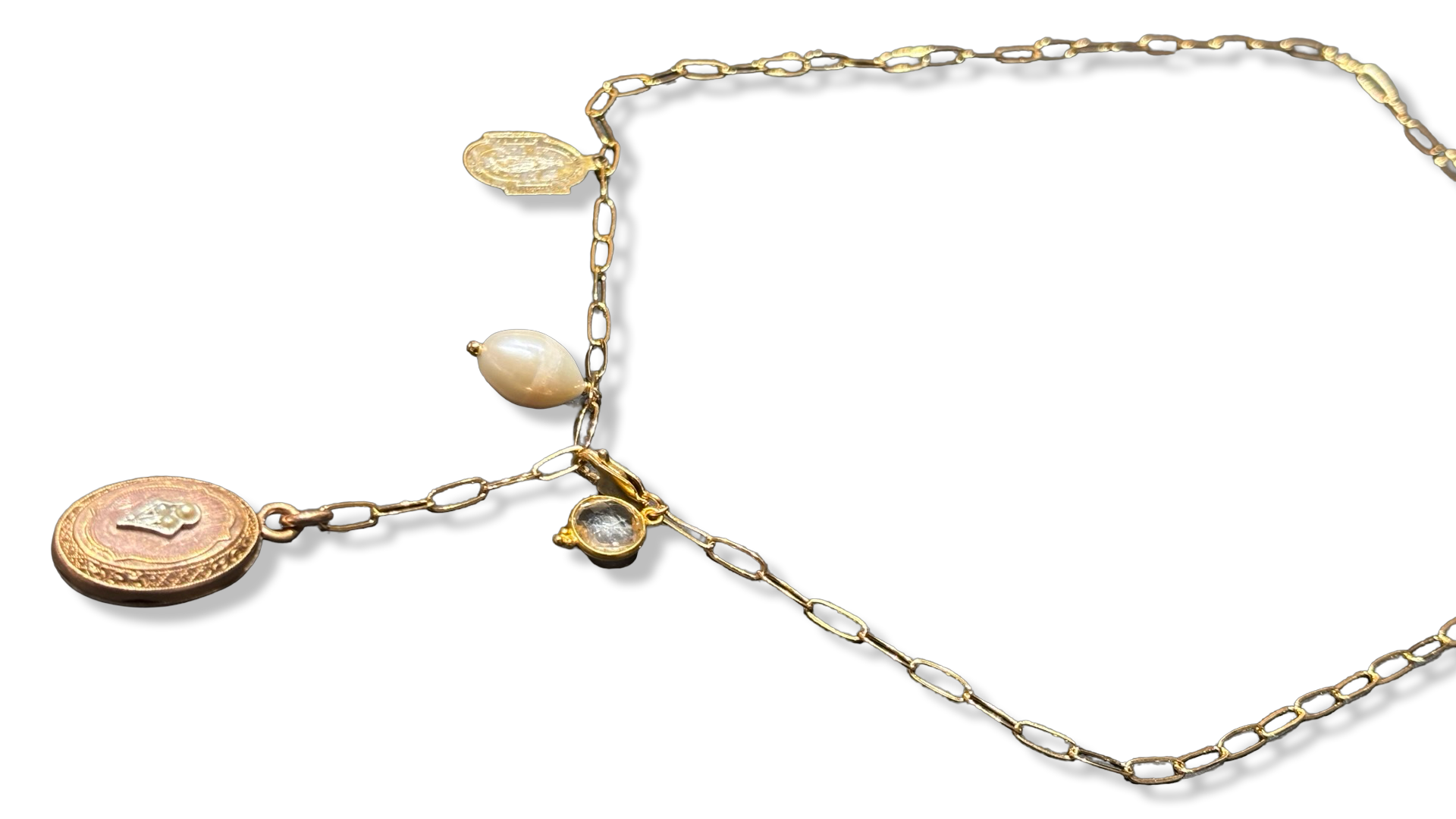 Collier lasso, médaillon à secret et perle