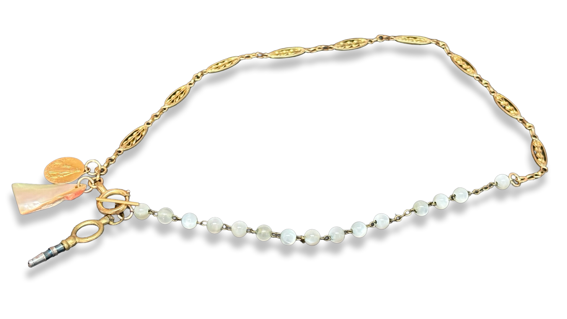 Collier chaîne de montre, chapelet de nacre et médaille de la Vierge.