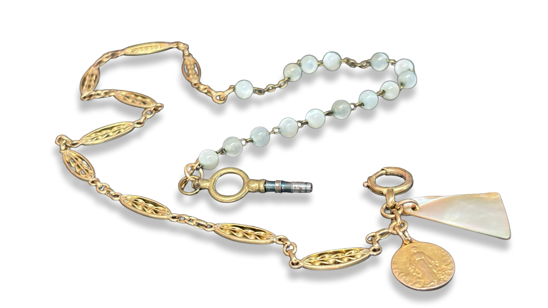 Collier chaîne de montre, chapelet de nacre et médaille de la Vierge.
